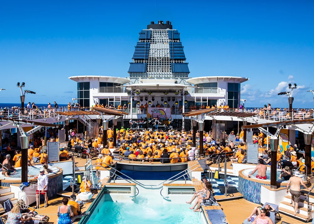 This image displays a rock show at a rock cruise.