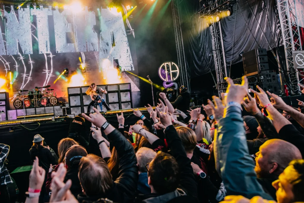 This image displays people at Rockfest, Finland.

In article about the best tips to enjoy a metal festival alone and how to find like-minded company and friends at a festival.